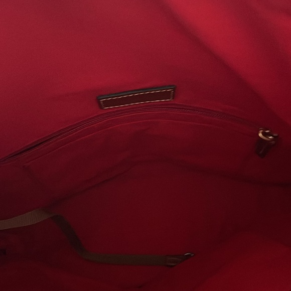 Dooney & Bourke shoulder purse. Burgundy colored. Like new. - Picture 5 of 6